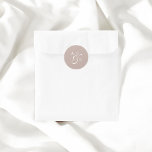 Beige Monogram Script Ampersand Wedding Classic Round Sticker<br><div class="desc">Celebrate your union with a touch of bespoke elegance using our personalised wedding stickers. Crafted with a focus on timeless sophistication, these stickers feature your monogram in a refined serif font, symbolising the strength and enduring nature of your bond. The ampersand, gracefully rendered in an elegant classic script, artistically connects...</div>