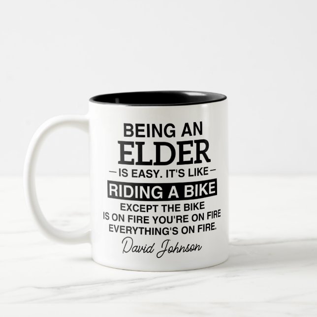 BEING AN ELDER IS EASY. IT'S LIKE RIDING A BIKE  Two-Tone COFFEE MUG (Left)