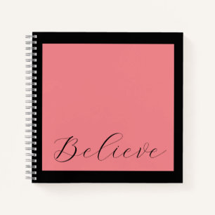 'Believe' Black Script Coral Pink Background Notebook