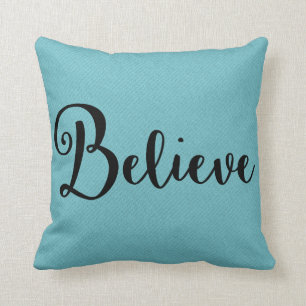 "Believe" Text in Black on Blue Pillow