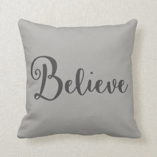 "Believe" Text in Dark Grey on Grey Pillow