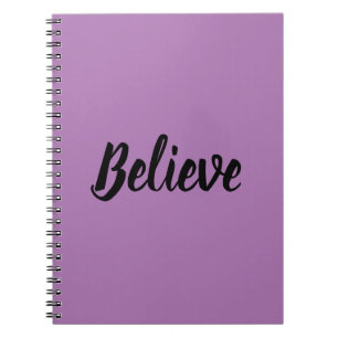 Believe typography in black purple background  notebook