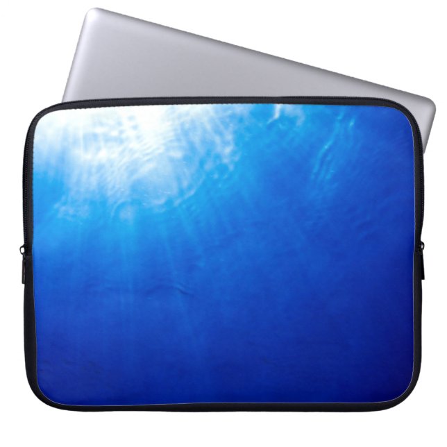 Below beneath blue deep dive laptop sleeve (Front)