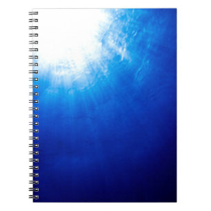 Below beneath blue deep dive notebook
