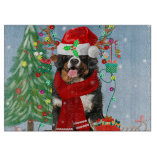 Bernese Mountain Dog in Snow with Christmas Gifts  Cutting Board