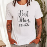 Best Man Black Script Personalised Wedding T-Shirt<br><div class="desc">Wedding Best Man shirt features modern black swirling calligraphy script writing with elegant custom first name text that you can personalise. See our coordinating bridal party designs!</div>