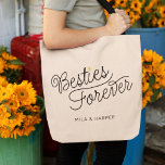 Besties Modern Script Gold Heart Custom Names<br><div class="desc">This modern tote bag with a minimalist casual chic script calligraphy design reading Besties Forever as well as your custom names features clean lines to create a sleek and sophisticated appearance. The understated style with the little printed gold heart detail adds a touch of sophistication to this perfect gift for...</div>