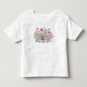 Between books and blooms book lover reader toddler T-Shirt