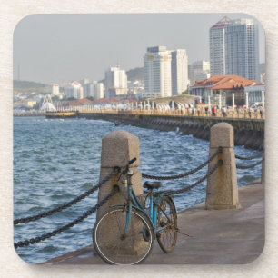 Bicycle at waterfront with Yantai city skyline, Coaster