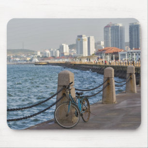 Bicycle at waterfront with Yantai city skyline, Mouse Pad