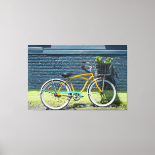Bicycle Leaning on Wall Canvas Print