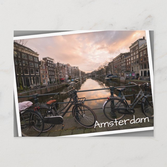 Bicycles at sunset in Amsterdam Postcard (Front)
