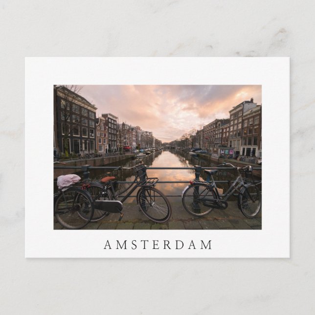 Bicycles at sunset in Amsterdam Postcard (Front)
