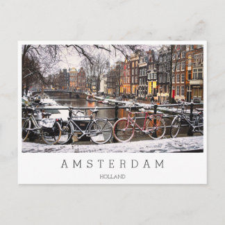 Bicycles in the snow in Amsterdam Postcard