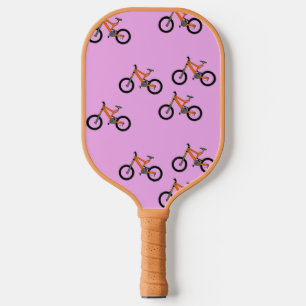 Bicycles pattern on pink pickleball paddle