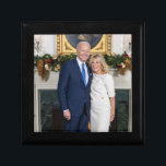Biden State of the Christmas Union Address   Gift Box<br><div class="desc">A Biden State of the Christmas Union Address - A festive hall, adorned with twinkling lights and adorned with evergreen boughs. A roaring fireplace casts a warm glow upon the gathered crowd. Santa Claus, the esteemed leader of the Christmas Union, rises to address the assembly. - "My fellow Elves, Reindeer,...</div>