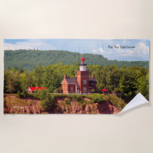 Big Bay Lighthouse from water beach towel