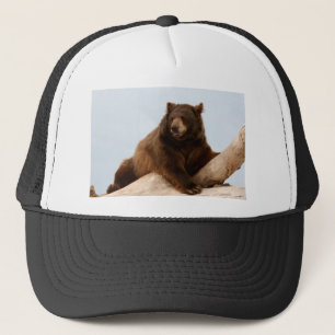 Big Brown Bear on a Log Trucker Hat