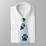 Big Dog Paw Prints Novelty Dog Lover's Neck Tie<br><div class="desc">This dog paw prints neck tie makes a fun gift for dog dads! Big brown paw prints on blue. Makes a cute novelty gift for Father's Day or just for fun for dog lovers.</div>