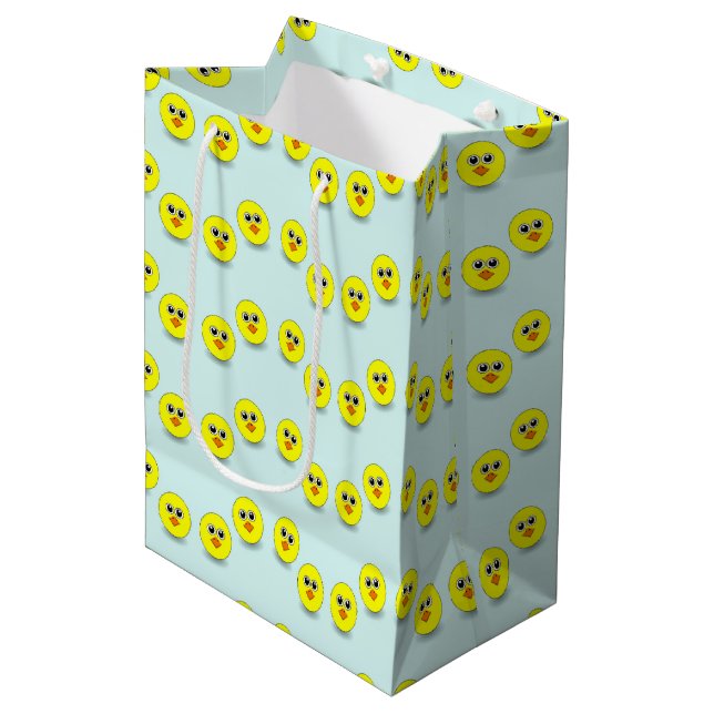 Big head chick on blue medium gift bag (Front Angled)