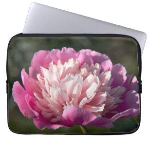 Big pink peony flowers in spring day laptop sleeve