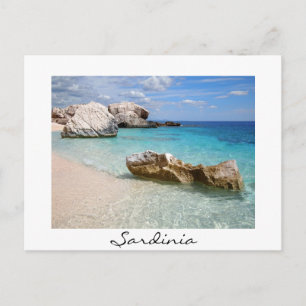 Big rocks at Cala Mariolu with text postcard