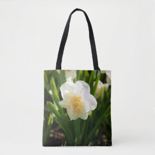 Big white daffodils on a spring day tote bag
