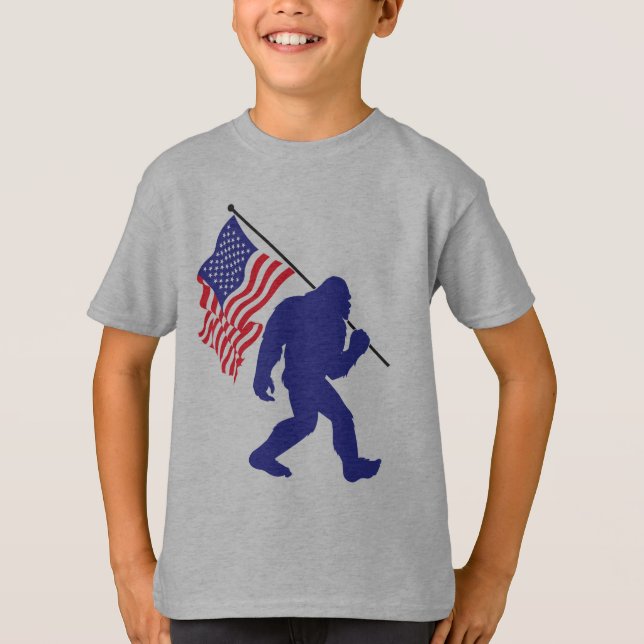 Bigfoot carrying a United States Flag T-Shirt (Front)