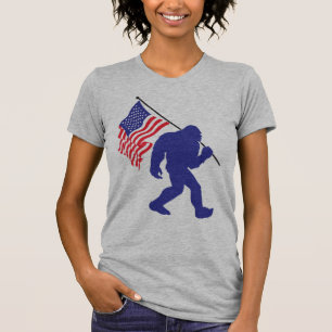 Bigfoot Carrying an American Flag T-Shirt