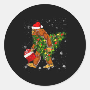 Bigfoot Carrying Christmas Tree Sasquatch Believer Classic Round Sticker