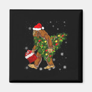 Bigfoot Carrying Christmas Tree Sasquatch Believer Magnet