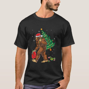 Bigfoot Carrying Christmas Tree Sasquatch Believer T-Shirt