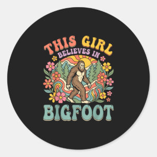 Bigfoot girl believes forest floral sunset classic round sticker