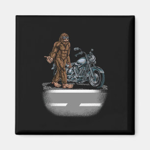 Bigfoot Riding A Motorcycle Bike Trying To Hitch A Magnet