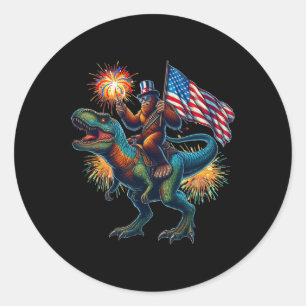 Bigfoot Sasquatch Riding Dinosaur T Rex. Funny 4th Classic Round Sticker