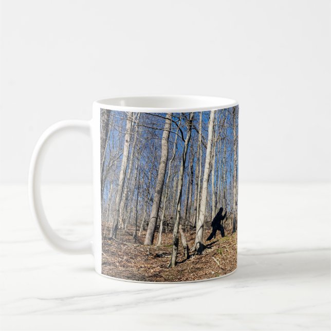 Bigfoot Walking in Woods Coffee Mug (Left)