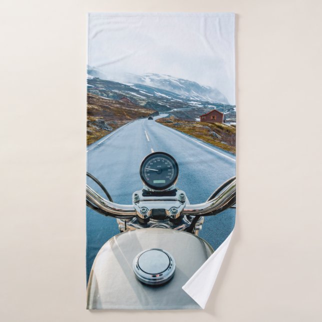 Biker rides a motorcycle on a slippery road throug bath towel (Bath Towel)
