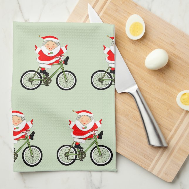 Biking Mrs. Claus Christmas Tea Towel (Quarter Fold)