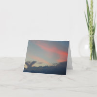 Bird in the Clouds at Sunrise