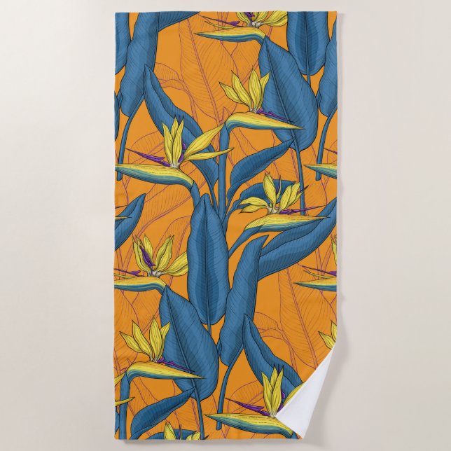 Bird of paradise flowers on orange beach towel (Front)