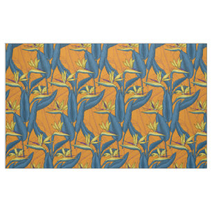 Bird of paradise flowers on orange fabric