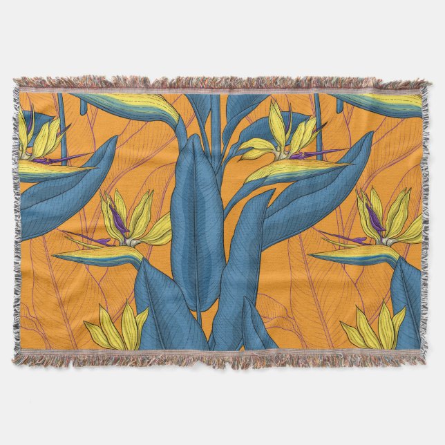 Bird of paradise flowers on orange throw blanket (Front)