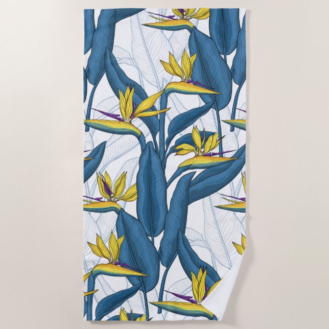 Bird of paradise flowers on white beach towel (Front)
