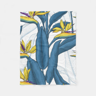 Bird of paradise flowers on white fleece blanket