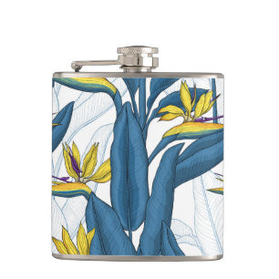 Bird of paradise flowers on white hip flask