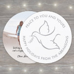 Bird of Peace Modern Dove Unique Round One Photo Holiday Card<br><div class="desc">Wish family and friends a simple gift of peace for the holidays with an elegant dove one photo round greeting card. All wording on this template (including "Peace" on front) is simple to customise, making it suitable for Christmas, New Years, Hanukkah and Rosh Hashanah. The modern minimalist white and grey...</div>