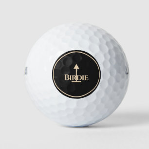 Birdie Apricot Beige on Almost Black Golf Balls