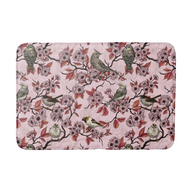 Birds and cherry blossom on rose pink bath mat (Front)