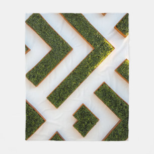 Bird's eye view of maze garden fleece blanket
