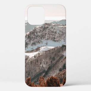 BIRD'S-EYE VIEW OF SNOW COVERED MOUNTAIN UNDER CLE iPhone 12 CASE